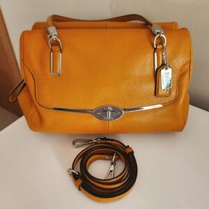Coach satchel style bag with cross body strap.